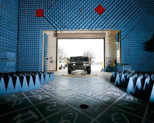 Hummer entering SSCSF anechoic chamber through inner access door